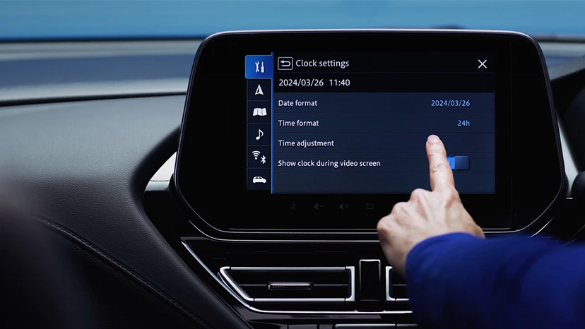Steps to change the clock settings in a Suzuki vehicle.