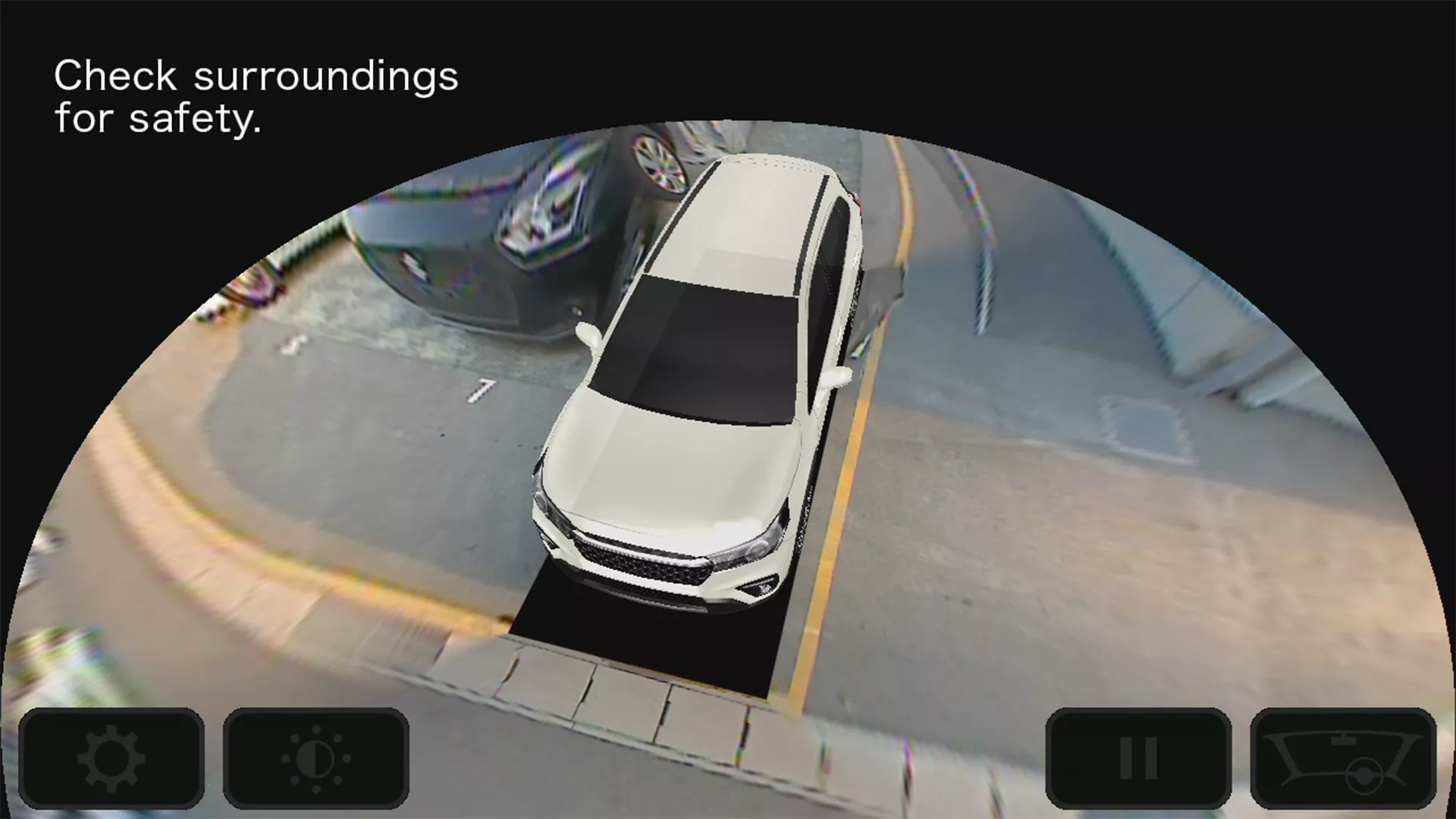 360-degree view camera display in the Suzuki S-Cross, showing a top-down parking perspective with proximity alerts and surrounding vehicle visibility for enhanced safety.