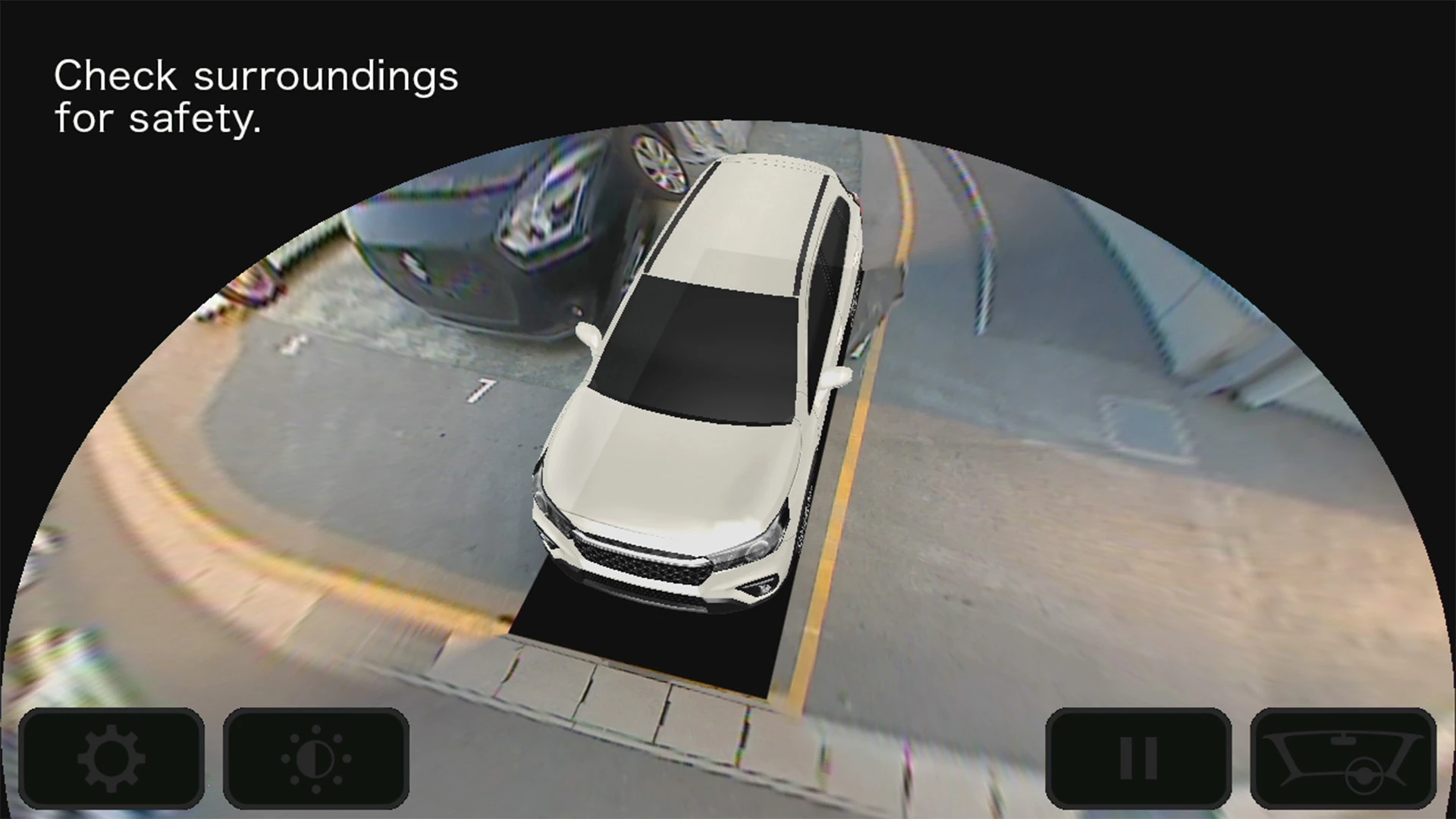 360-degree view camera display in the Suzuki S-Cross, showing a top-down parking perspective with proximity alerts and surrounding vehicle visibility for enhanced safety.