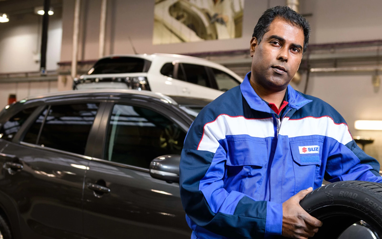 Suzuki engineer with tyre