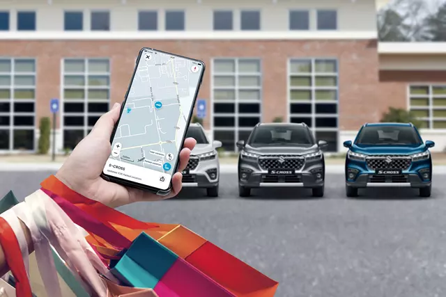 Suzuki S-Cross Connect App on phone screen, controlling several parked Suzuki S-Cross