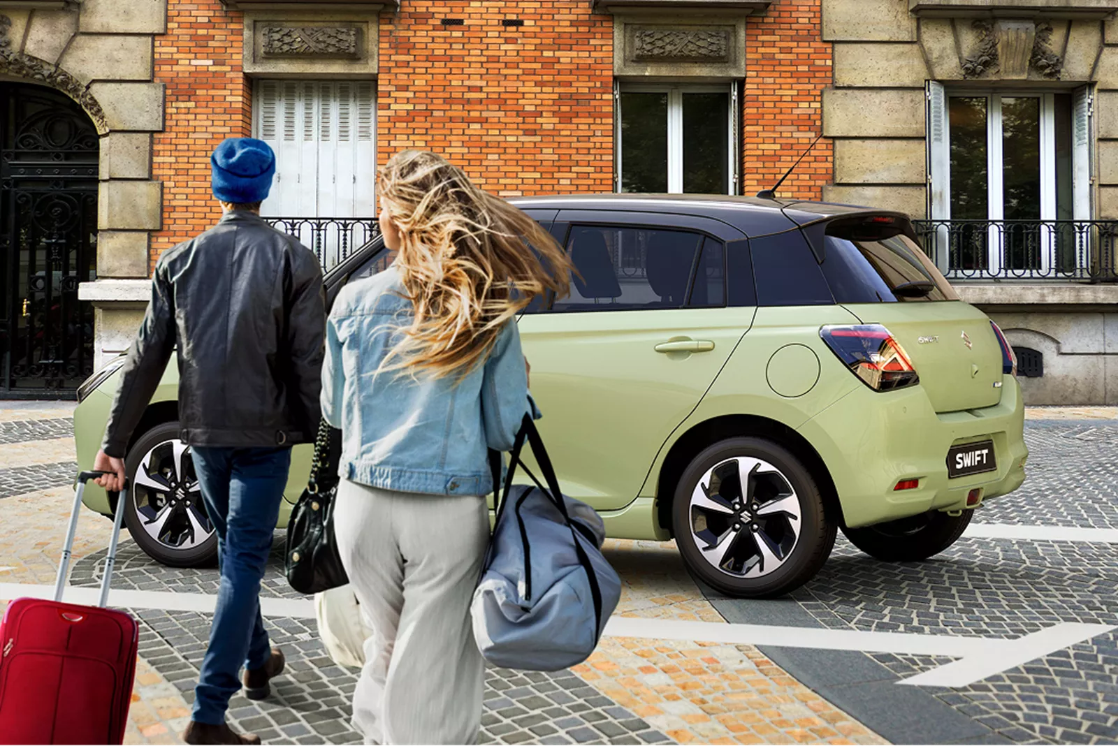 Suzuki people with luggage in a hatchback