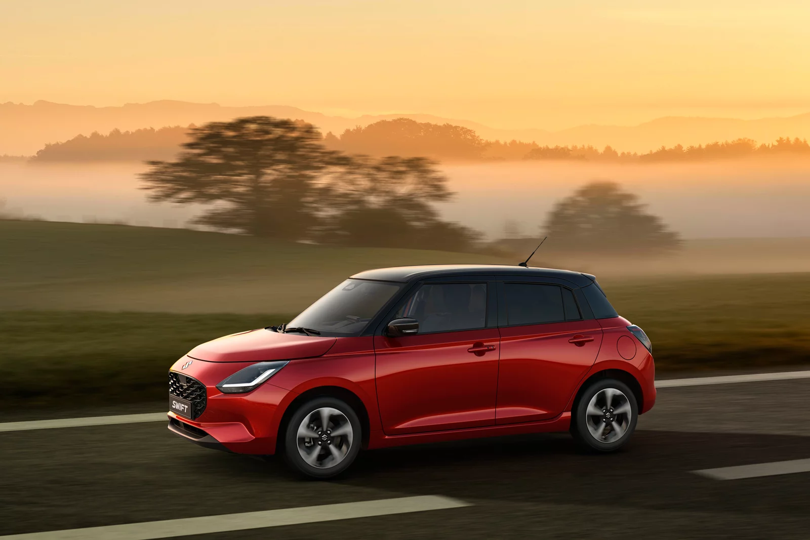 Burning Red Suzuki Swift takes to the roads