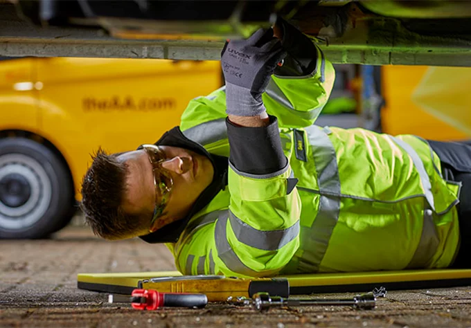 Engineer working under car