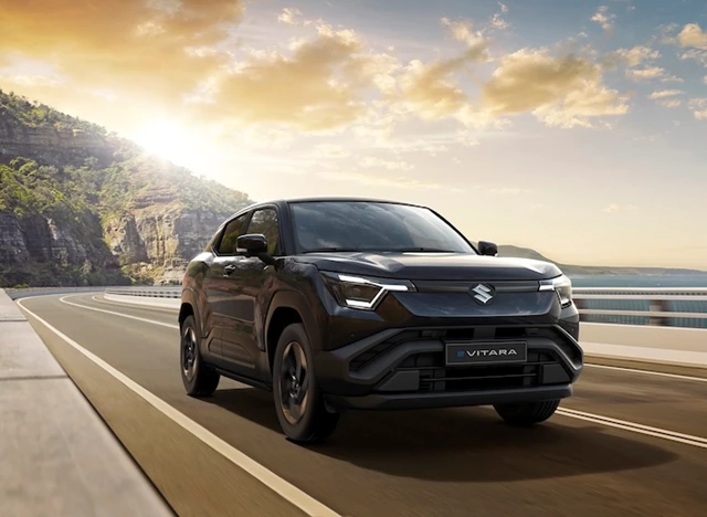Suzuki e Vitara Motion driving on road