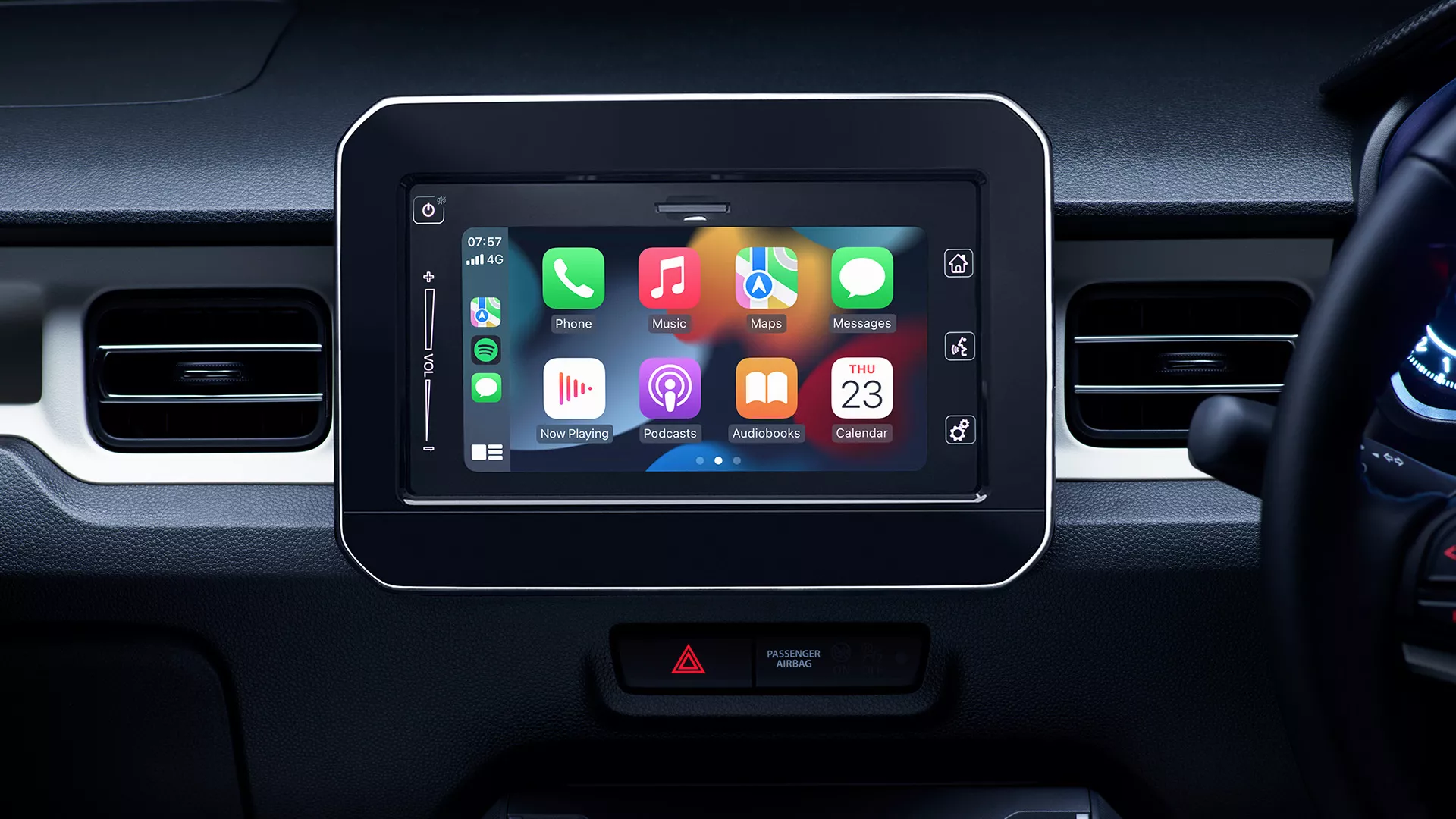 Close-up of Suzuki Ignis infotainment system with climate control panel.