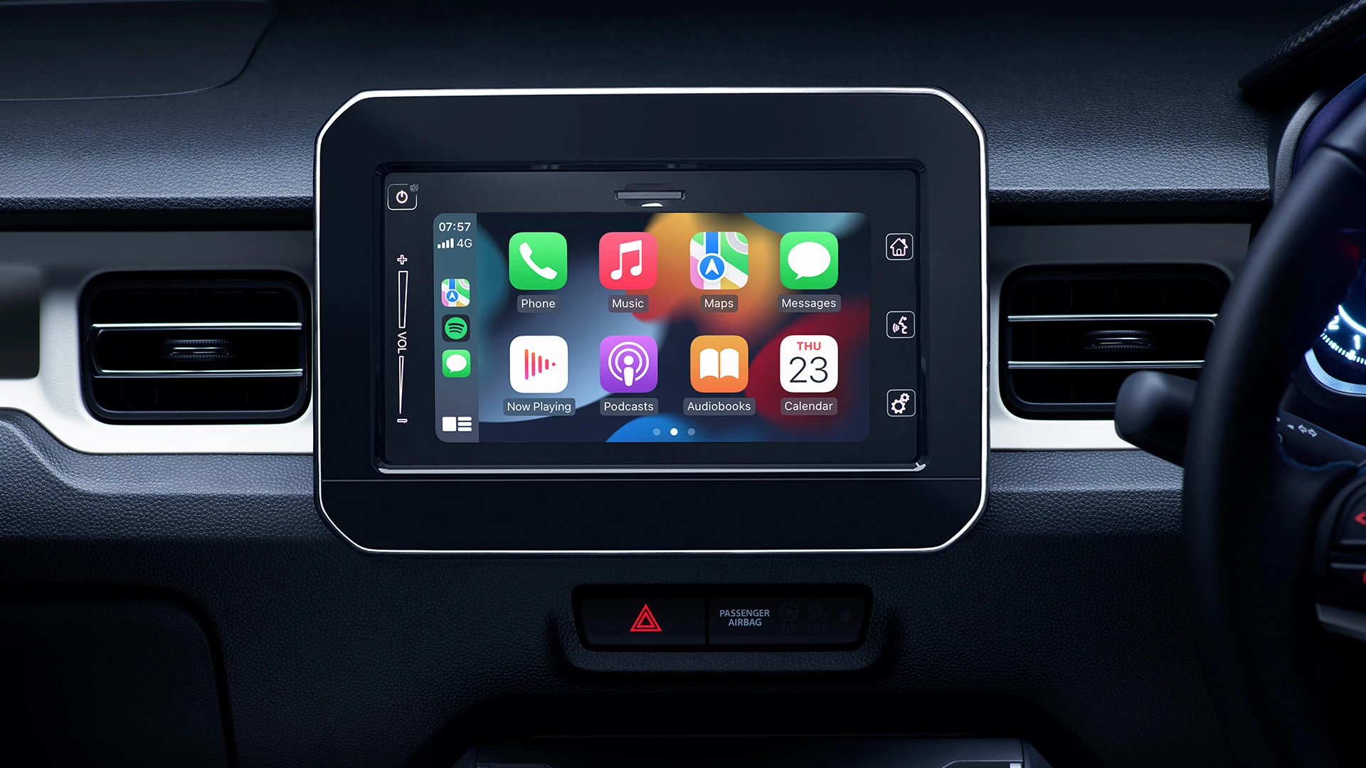 Close-up of Suzuki Ignis infotainment system with climate control panel.