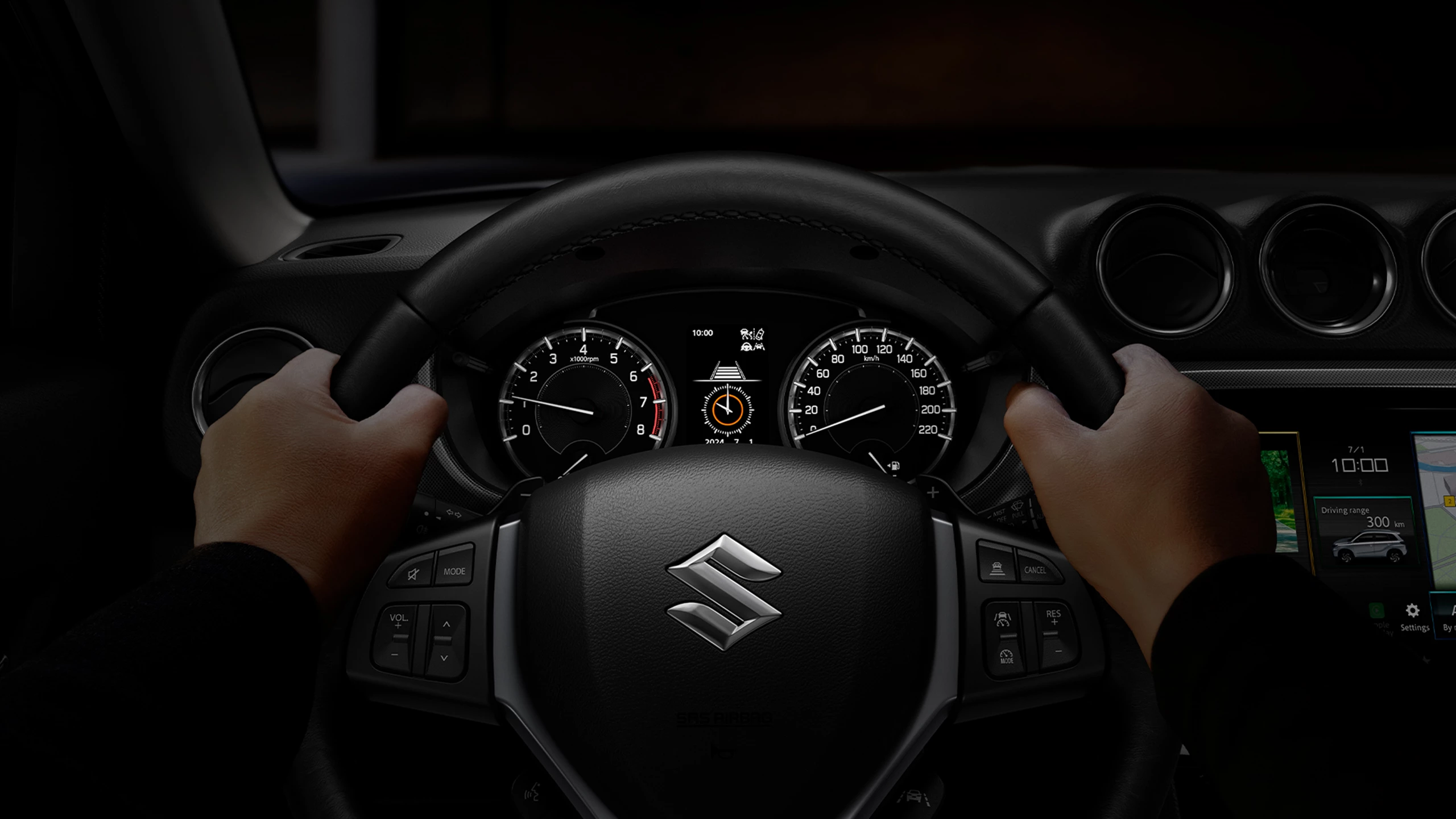 Driver’s view of the Suzuki Vitara of the multifunction steering wheel, displaying the Adaptive Cruise Control system active on the digital display.