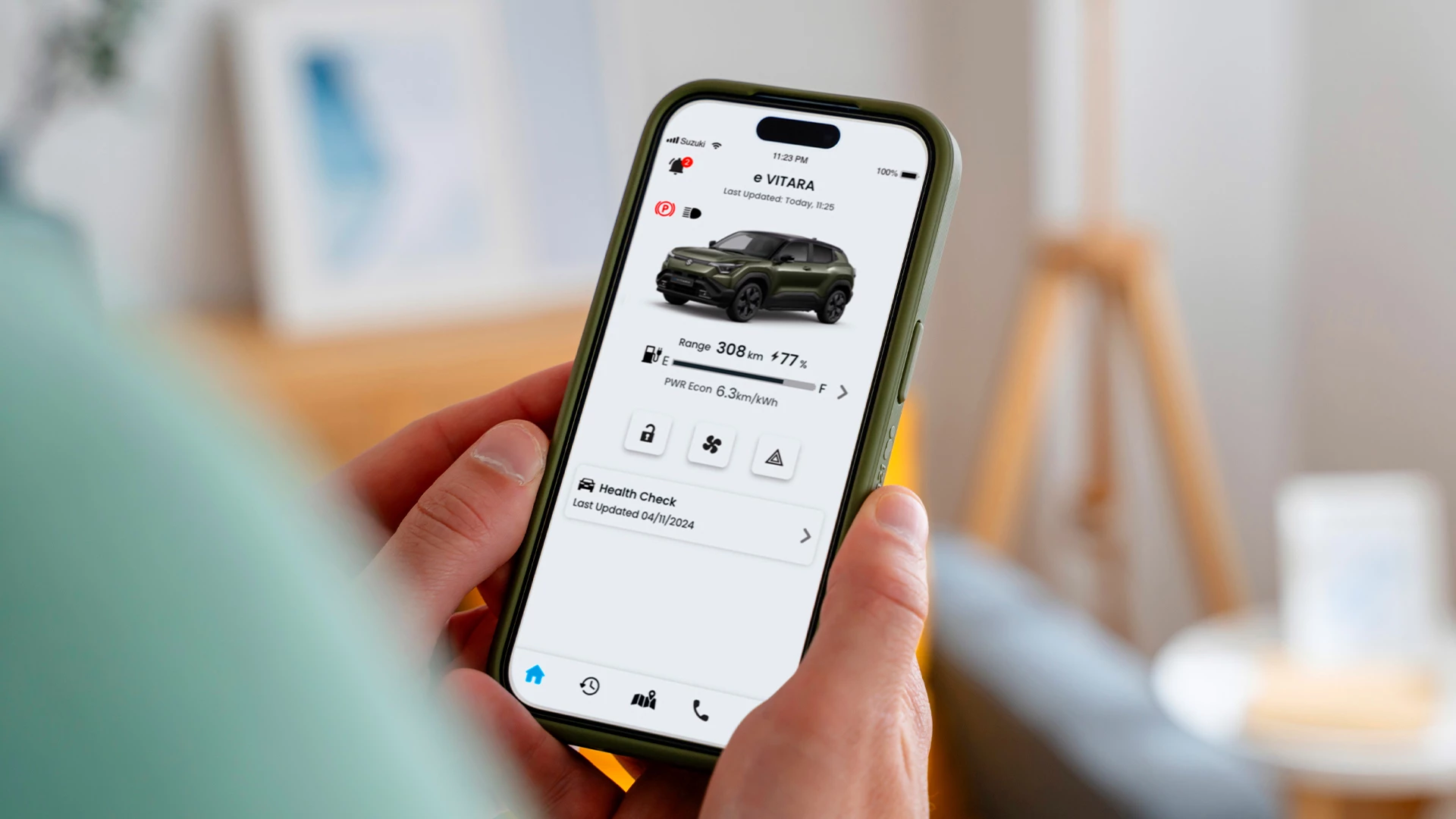 Suzuki Connect app checking e Vitara vehicle status, including range, battery level, and remote functions on phone