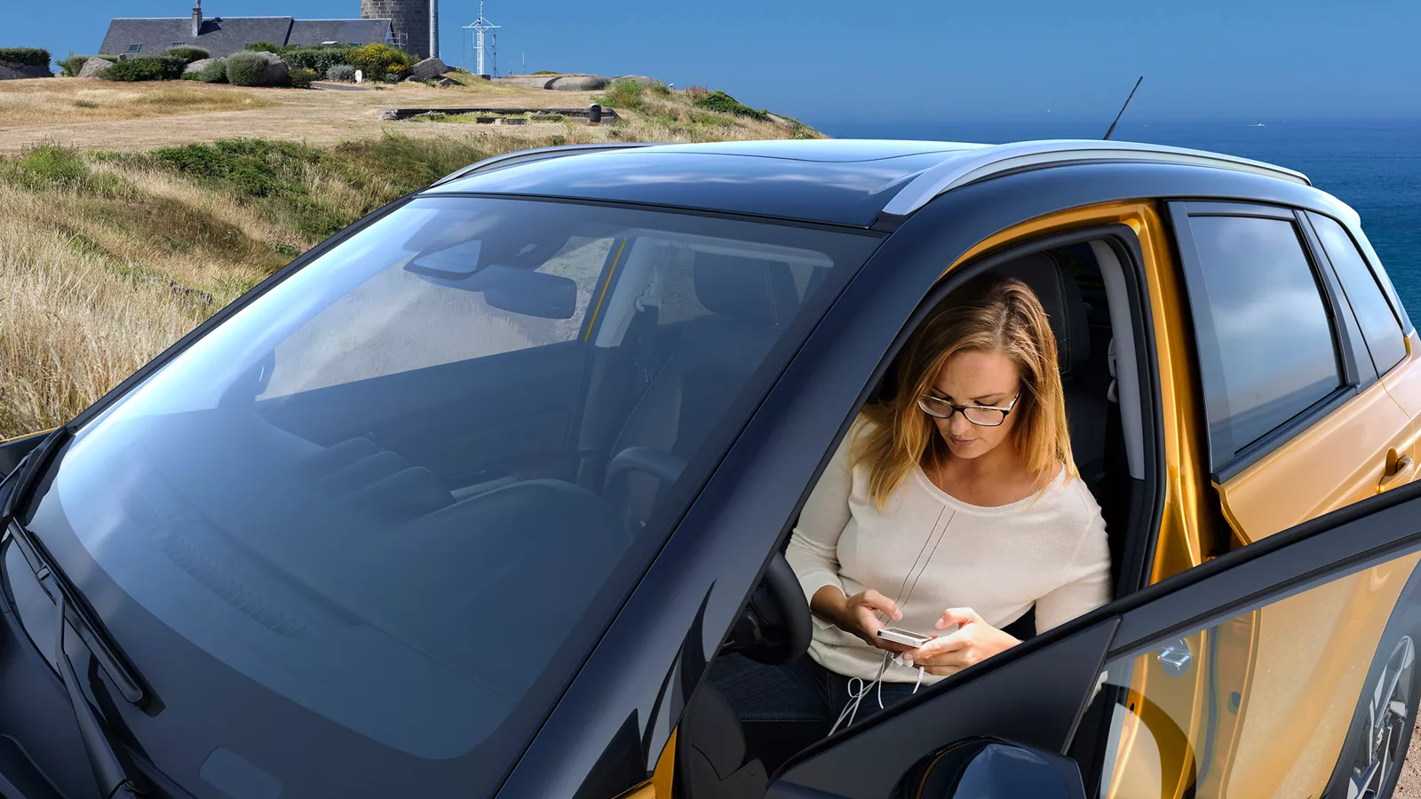 Suzuki woman texting on the driving seat